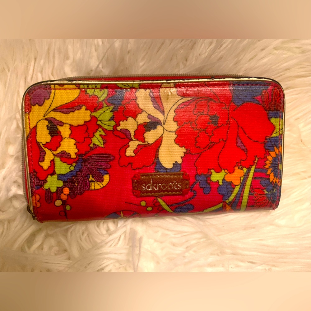 Beautiful tropical print SaksRoots Wallet. Gently used